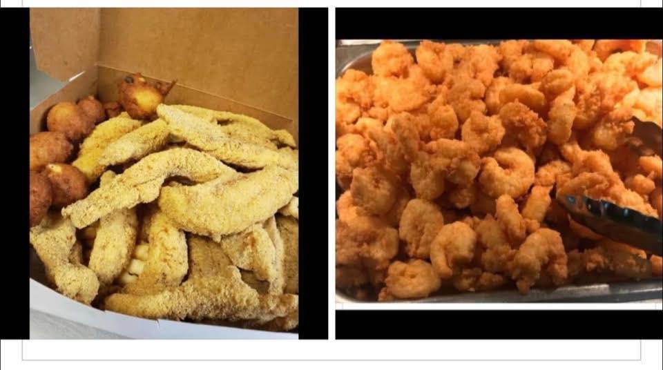 Stainless trays of fried seafood on the buffet line